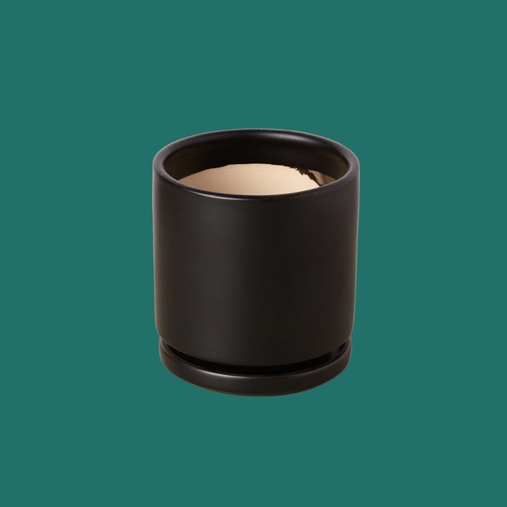 Black cylindrical container with beige interior from Houseofagave.store
